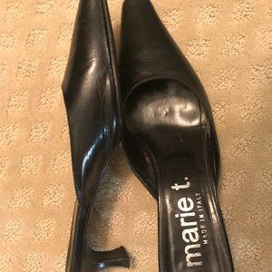 European open back medium heels.